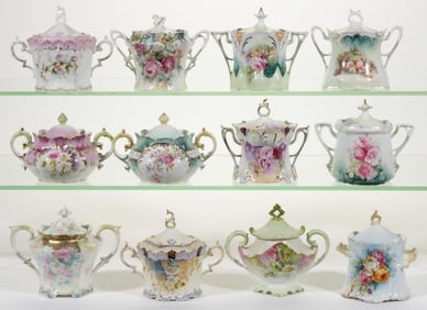R.S. PRUSSIA PORCELAIN FLORAL MOTIF SUGAR BOWLS, LOT OF 12