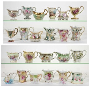R.S. PRUSSIA / GERMANY PORCELAIN FLORAL MOTIF CREAMERS, LOT OF 23