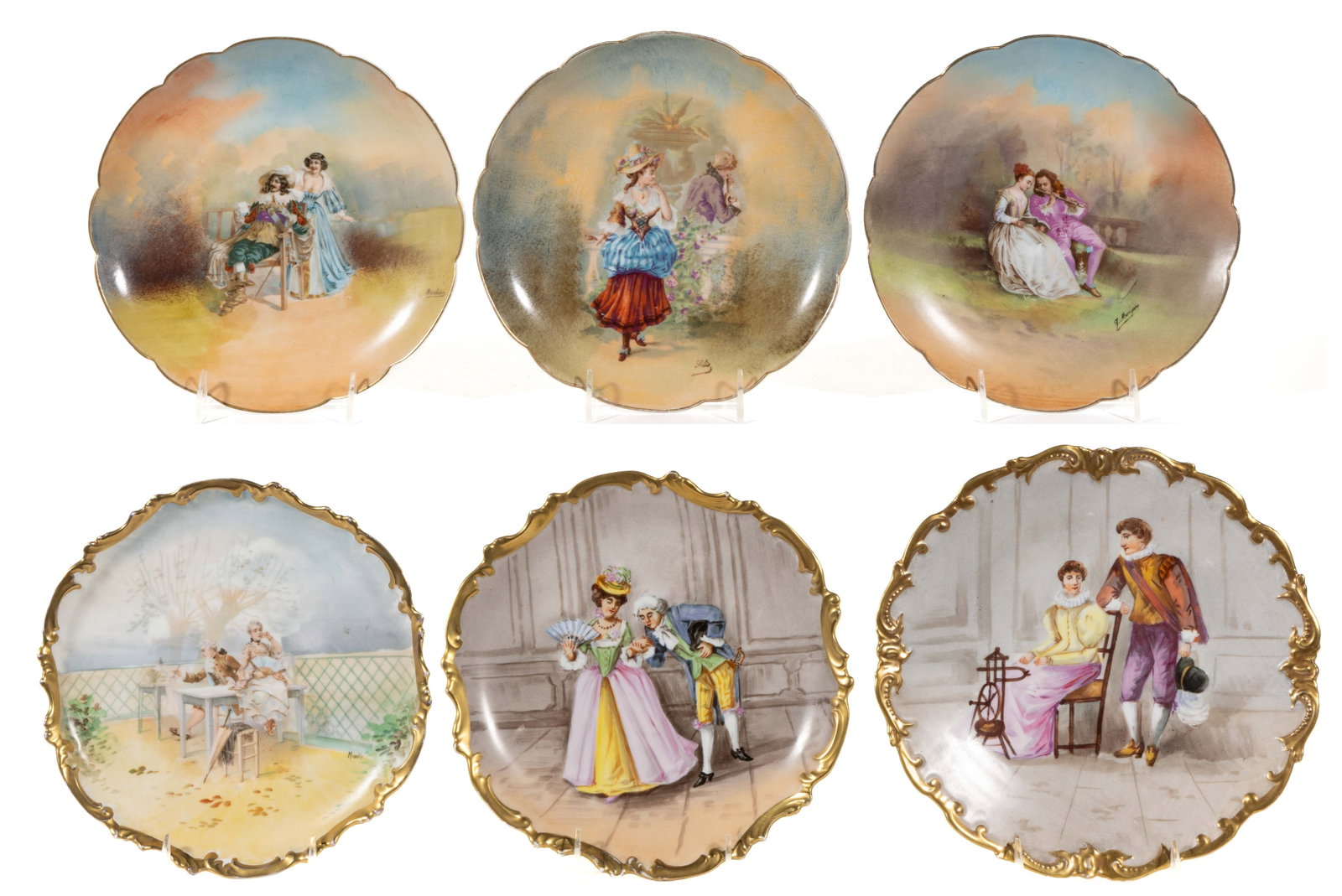 FRENCH LIMOGES PORCELAIN COUPLES MOTIF PLAQUES, LOT OF SIX: FRENCH LIMOGES PORCELAIN COUPLES MOTIF PLAQUES, LOT OF SIX, each depicting figures in colonial dress, comprising two examples depicting young men serenading a woman with an instrument, one example fea