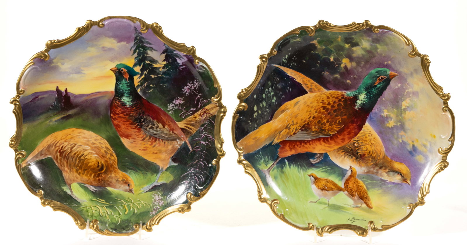 FRENCH LIMOGES PORCELAIN HAND-PAINTED PHEASANT BIRD MOTIF LARGE PLAQUES, LOT OF TWO: FRENCH LIMOGES PORCELAIN HAND-PAINTED PHEASANT BIRD MOTIF LARGE PLAQUES, LOT OF TWO, each having bright polychrome scenes depicting a male and female pair including one example with additional chicks.