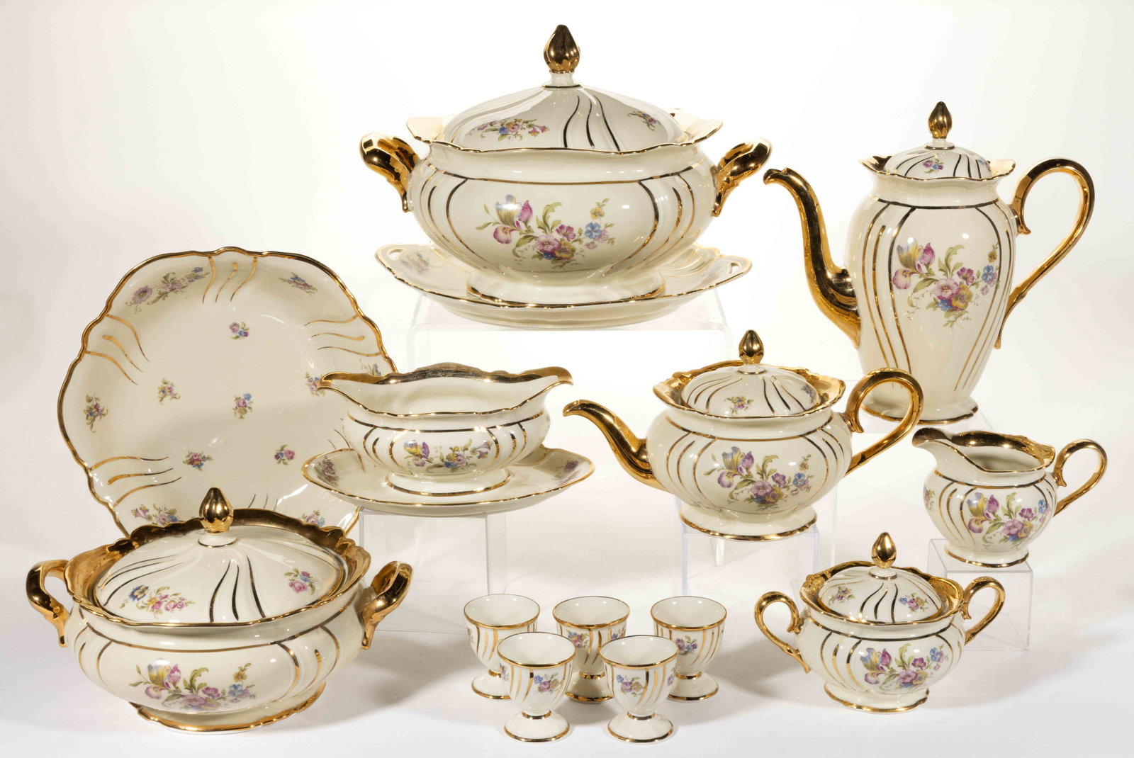GERMAN ROSENTHAL PORCELAIN "LOMBUL" DRINKING AND TABLE ARTICLES, LOT OF 14: GERMAN ROSENTHAL PORCELAIN "LOMBUL" DRINKING AND TABLE ARTICLES, LOT OF 14, each having polychrome transfer floral designs on cream ground with additional gilt decorations, comprising a teapot, a coff