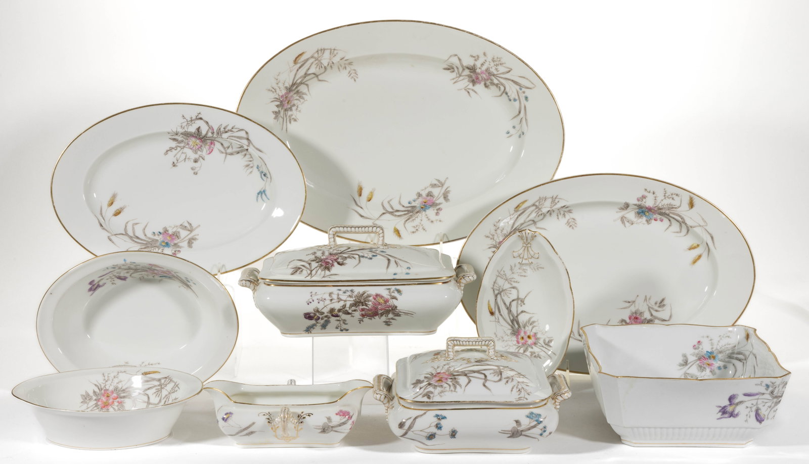 FRENCH HAVILAND LIMOGES PORCELAIN FLORAL MOTIF TABLE ARTICLES, LOT OF TEN: FRENCH HAVILAND LIMOGES PORCELAIN FLORAL MOTIF TABLE ARTICLES, LOT OF TEN, each having transfer and polychrome hand-painted wildflower designs and gilt accents, including three open vegetable dishes i