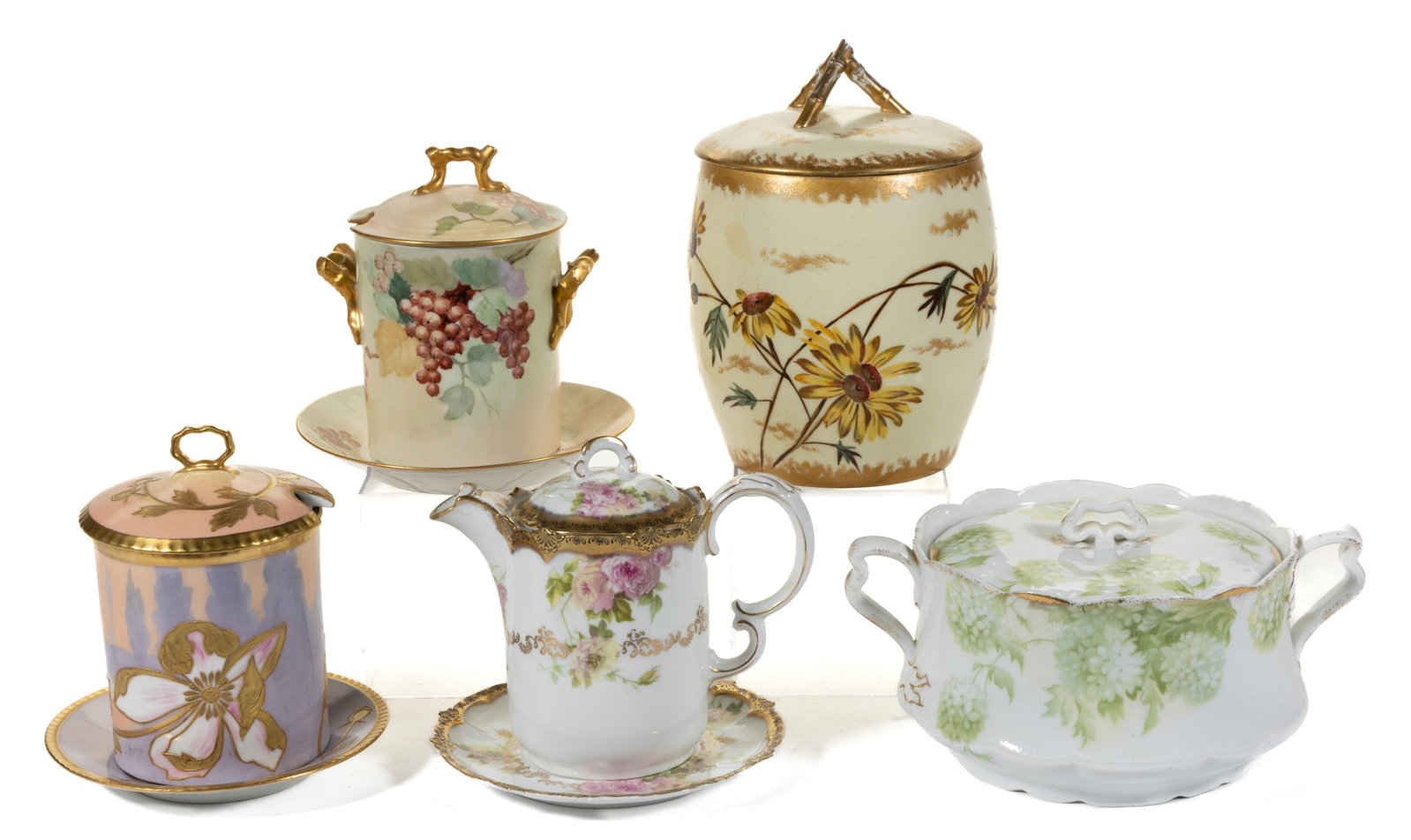 FRENCH LIMOGES / GERMAN PORCELAIN TABLE ARTICLES, LOT OF FIVE: FRENCH LIMOGES / GERMAN PORCELAIN TABLE ARTICLES, LOT OF FIVE, comprising covered biscuit jar having polychrome hand-painted daisy motif on cream ground, a covered cracker jar featuring transfer snowb