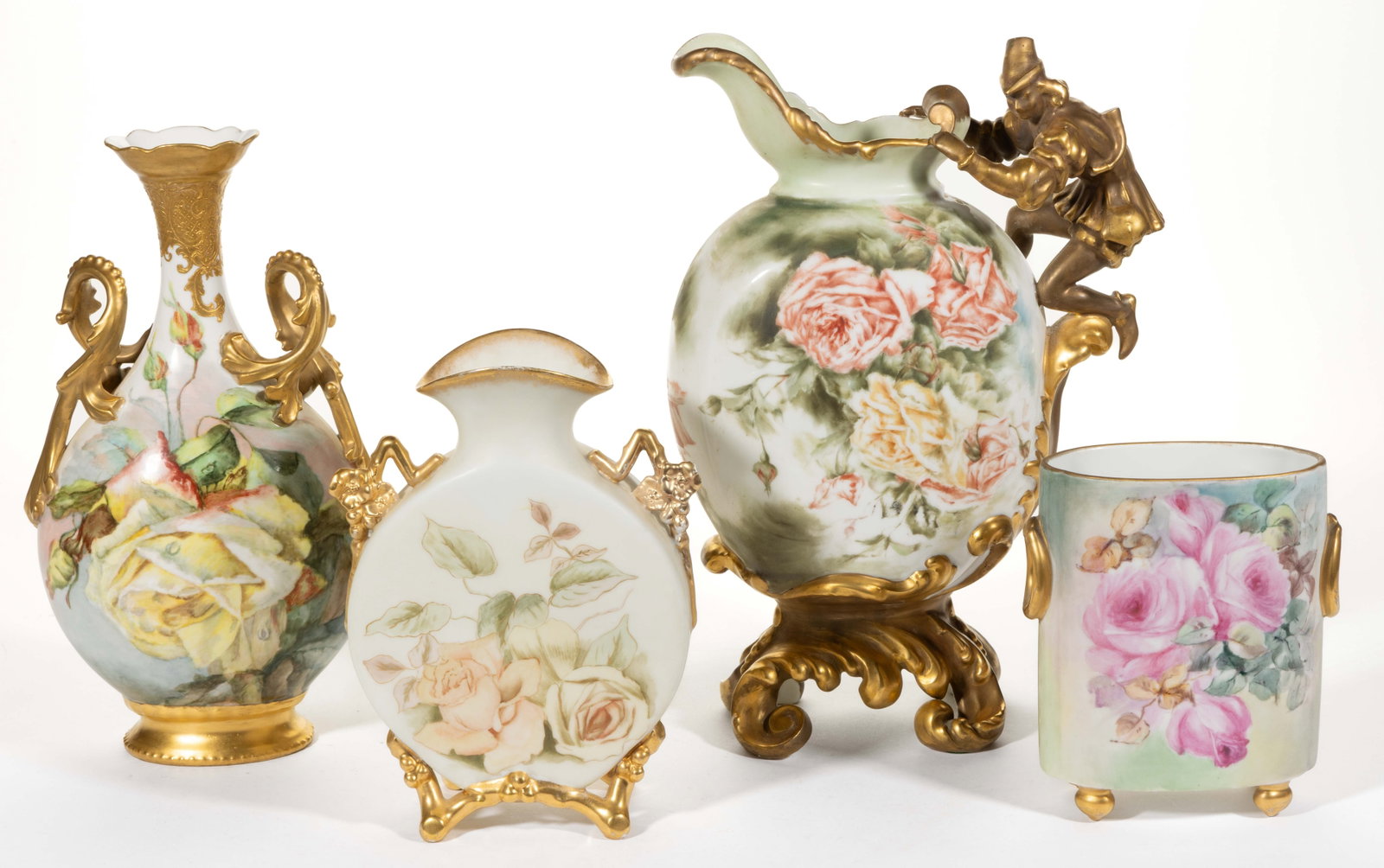FRENCH LIMOGES PORCELAIN HAND-PAINTED FLORAL MOTIF VASES, LOT OF FOUR: FRENCH LIMOGES PORCELAIN HAND-PAINTED FLORAL MOTIF VASES, LOT OF FOUR, each having flattened body with polychrome decorations and gilt accents, comprising one ewer-form example having a bold scrolled 