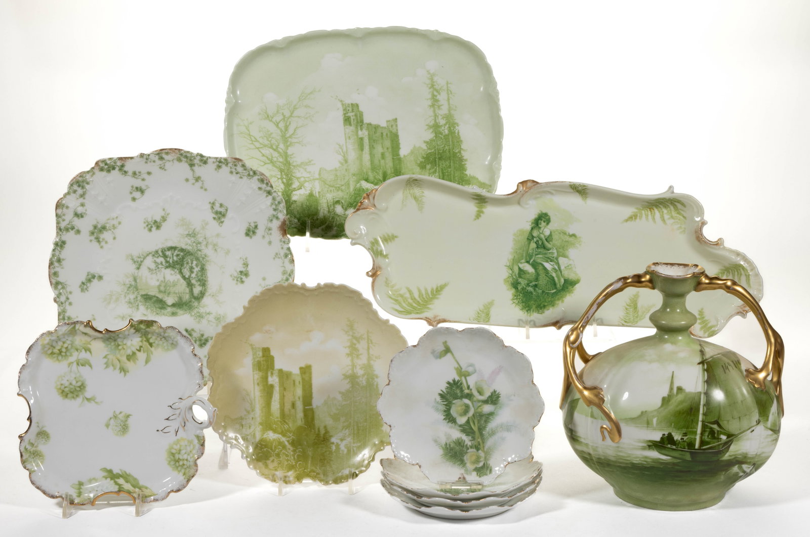 FRENCH LIMOGES / GERMAN PORCELAIN GREEN-DECORATED ARTICLES, LOT OF TEN: FRENCH LIMOGES / GERMAN PORCELAIN GREEN-DECORATED ARTICLES, LOT OF TEN, including two examples depicting transfer castle scene including a plate and a 11 3/8" x 8 5/8" rectangular tray, a 16 3/8" x 5 