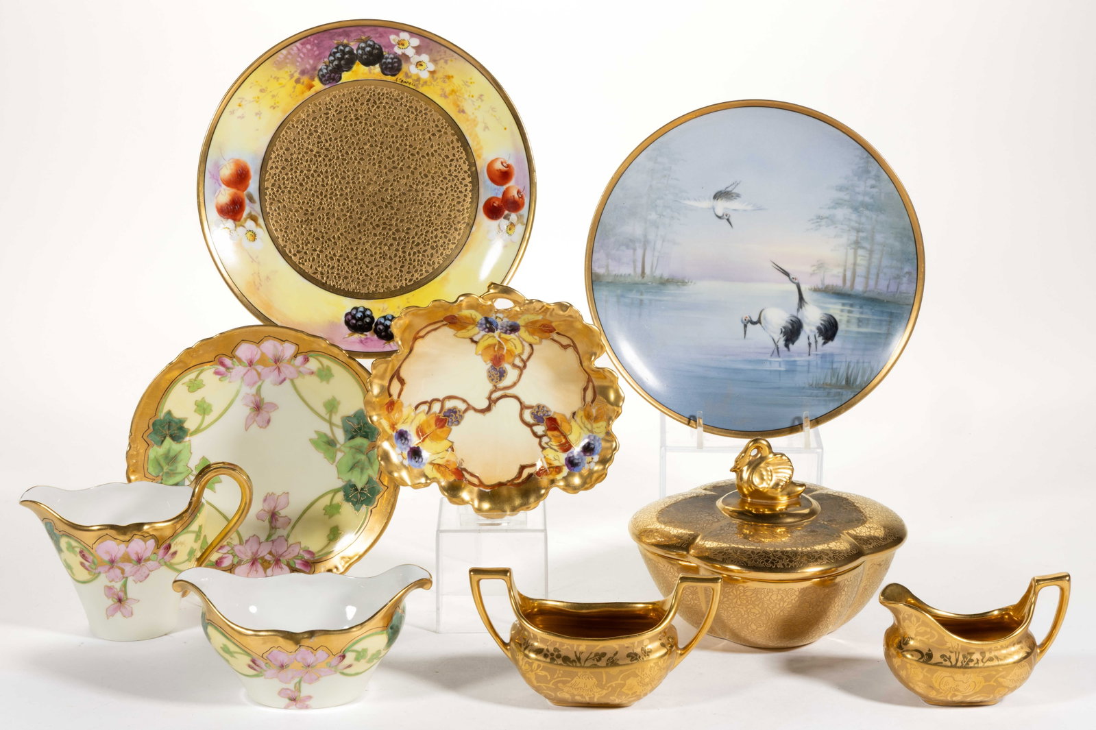 CHICAGO-DECORATED PICKARD-STYLE PORCELAIN ARTICLES, LOT OF NINE: CHICAGO-DECORATED PICKARD-STYLE PORCELAIN ARTICLES, LOT OF NINE, each having additional gilt decorations, comprising one White's Art Co. leaf-form dish with blackberry motif initialed "EM." and eight 