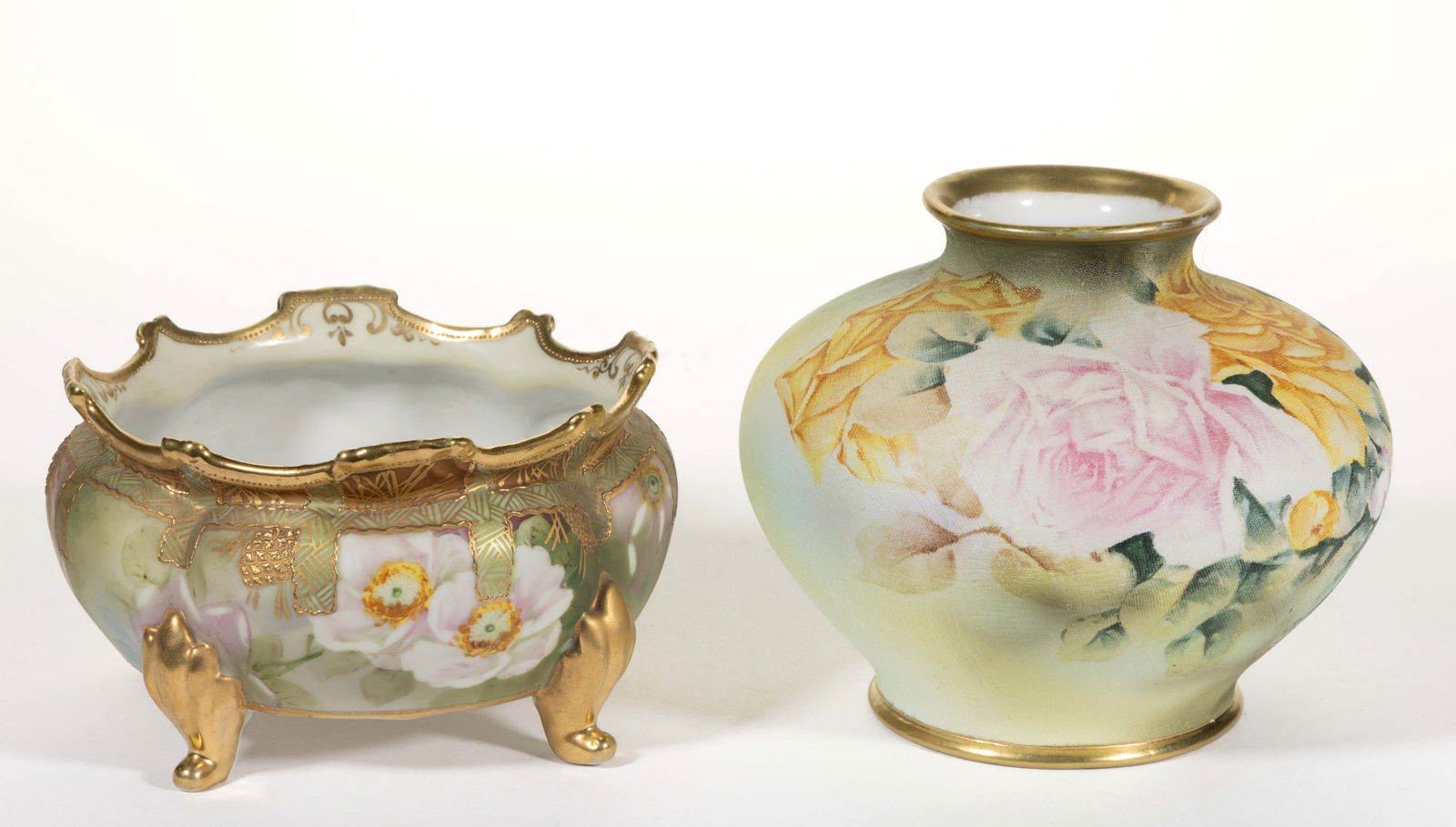 JAPANESE NIPPON PORCELAIN FLORAL MOTIF ARTICLES, LOT OF TWO: JAPANESE NIPPON PORCELAIN FLORAL MOTIF ARTICLES, LOT OF TWO, comprising four-footed polychrome hand-painted ferner featuring beautiful pink roses and raised gilt decorations including pinecones and a