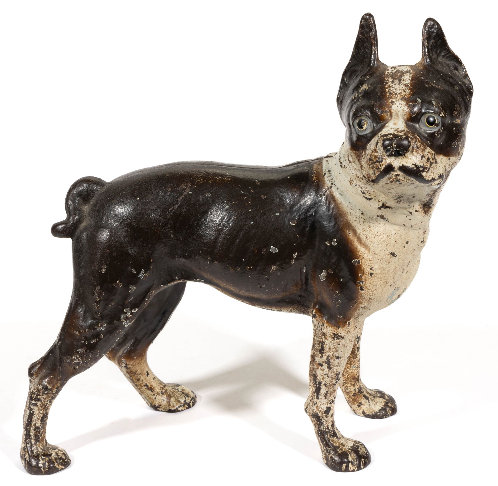 HUBLEY CAST-IRON BOSTON TERRIER DOG DOORSTOP: HUBLEY CAST-IRON BOSTON TERRIER DOG DOORSTOP, hollow full-body form depicting a Boston terrier, cast in a two-part mold, retaining a likely original polychrome painted surface. First half 20th century
