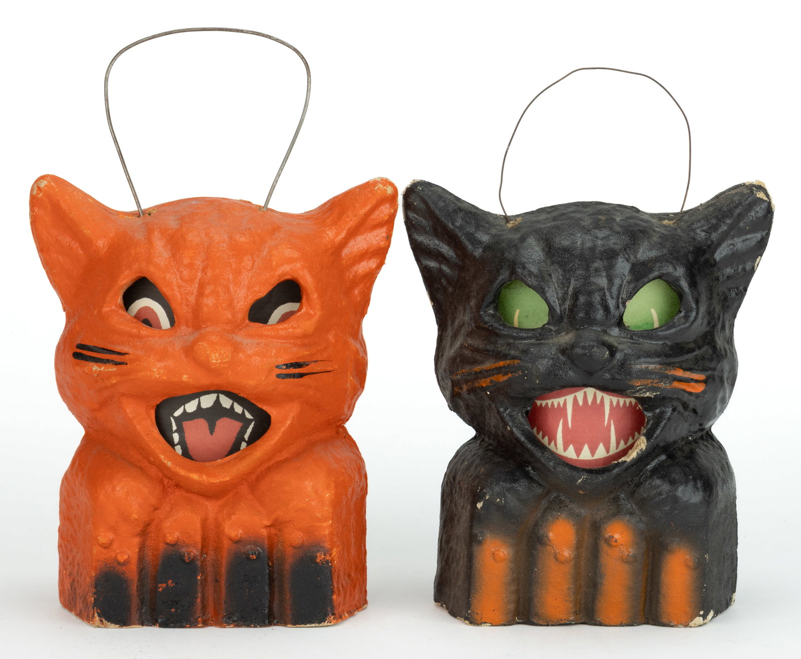 AMERICAN PAPIER-MACHE / PULP CAT ON FENCE HALLOWEEN LANTERNS, LOT OF TWO: AMERICAN PAPIER-MACHE / PULP CAT ON FENCE HALLOWEEN LANTERNS, LOT OF TWO, each of the same form, one with a black base layer of paint, the other with an orange base layer of paint, each with contrasti