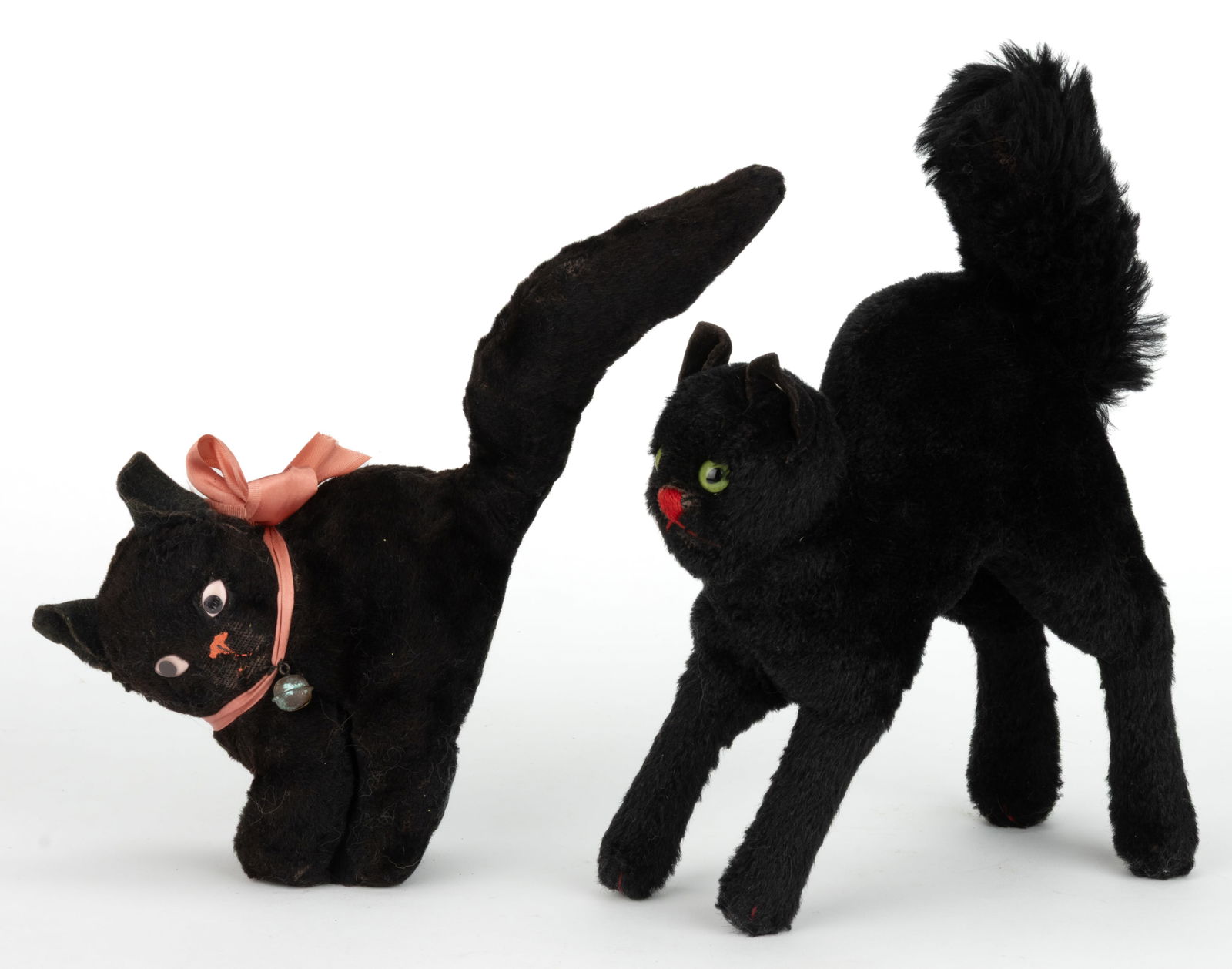 VINTAGE GERMAN STEIFF STUFFED HALLOWEEN BLACK CAT: VINTAGE GERMAN STEIFF STUFFED HALLOWEEN BLACK CAT, the standing figure with an arched back, big fluffy tail, and green eyes. Retains the Steiff button to its left ear. Together with an English Merryth