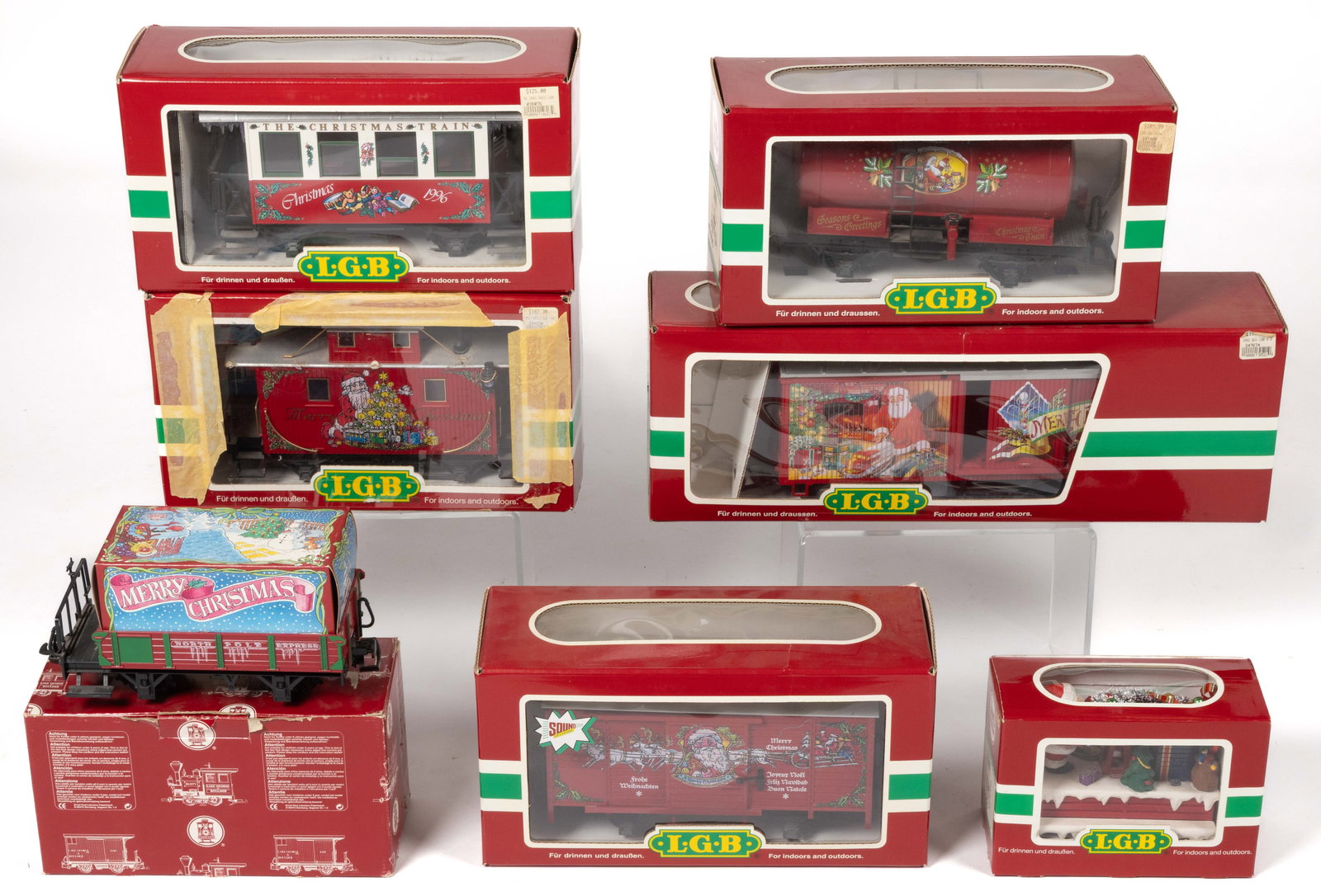 GERMAN L. G. B. LEHMANN ASSORTED G-SCALE MODEL RAILROAD CHRISTMAS CARS, LOT OF SEVEN: GERMAN L. G. B. LEHMANN ASSORTED G-SCALE MODEL RAILROAD CHRISTMAS CARS, LOT OF SEVEN, comprising a No. 36076 passenger coach car; a No. 43352 box car with speaker; a No. 44650 caboose; a No. 47400 tan