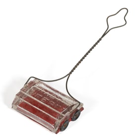 BABY SWEEPER / CARPET SWEEPER FIGURAL PRESSED GLASS CANDY CONTAINER