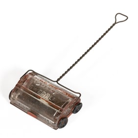 DOLLY SWEEPER / CARPET SWEEPER FIGURAL PRESSED GLASS CANDY CONTAINER