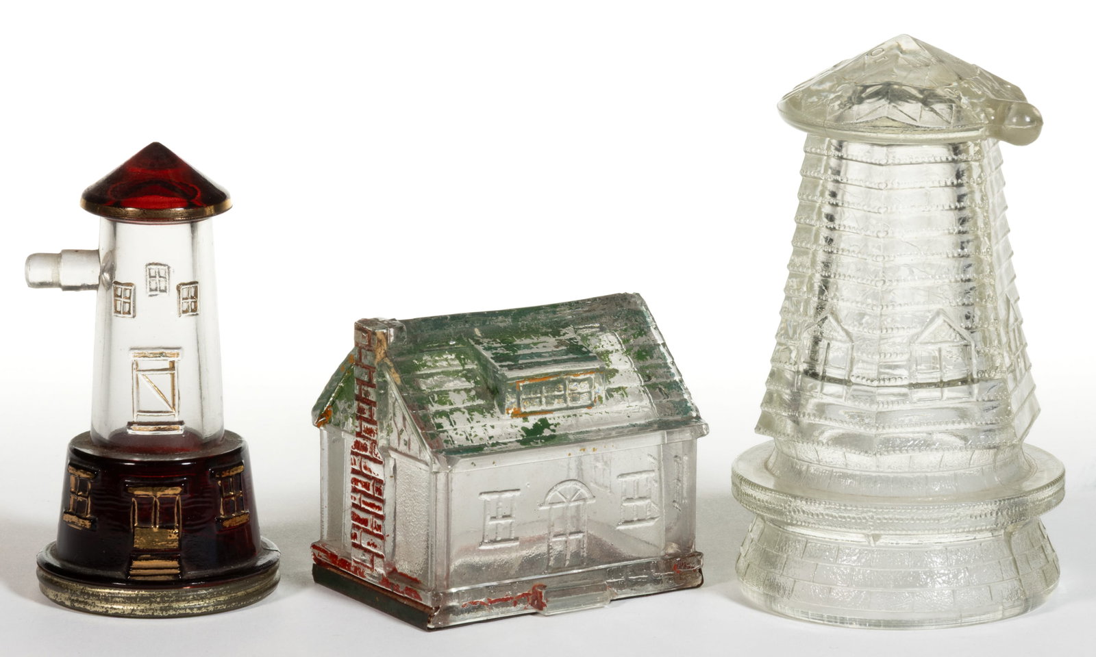 ASSORTED WINDMILLS AND OTHER FIGURAL PRESSED GLASS CANDY CONTAINERS, LOT OF THREE: ASSORTED WINDMILLS AND OTHER FIGURAL PRESSED GLASS CANDY CONTAINERS, LOT OF THREE, colorless, comprising a "Dutch" Windmill, a "Five Windows" Windmill with ruby-staining and gilt h