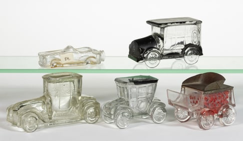 ASSORTED AUTOMOBILES AND OTHER FIGURAL PRESSED GLASS CANDY CONTAINERS, LOT OF FIVE