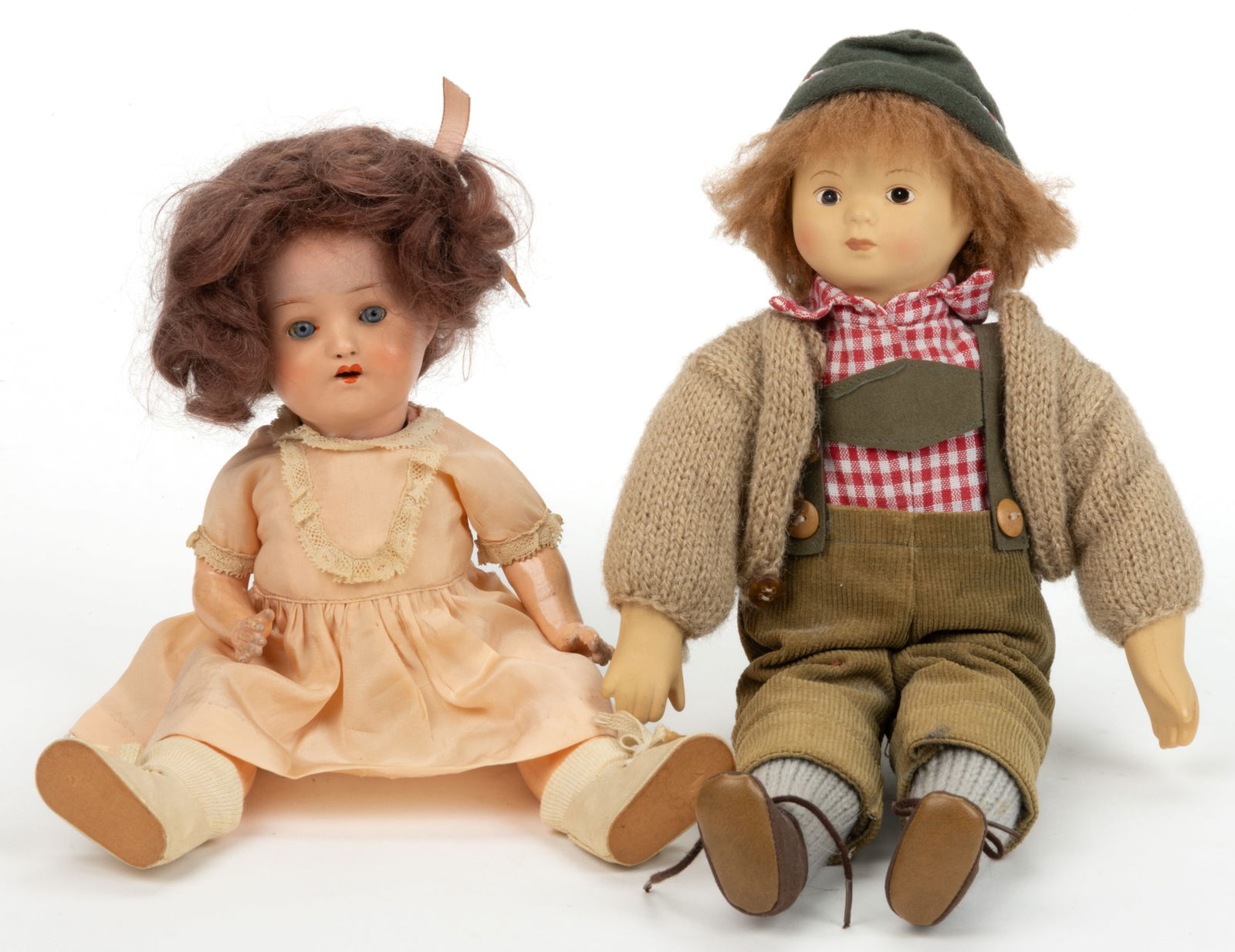 ASSORTED GERMAN BISQUE DOLLS, LOT OF TWO: ASSORTED GERMAN BISQUE DOLLS, LOT OF TWO, comprising a Heubach Koppelsdorf girl example, bisque socket head incised on back "HEUBACH KOPPELSDORF / 320-12/0 / GERMANY", sleepy blue eyes,