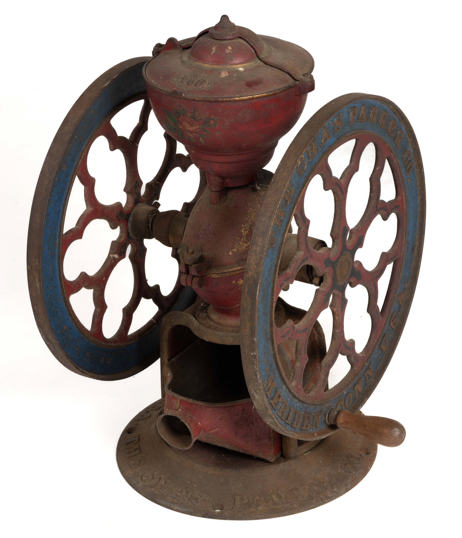 CHARLES PARKER NO. 700 CAST-IRON TWO-WHEEL COFFEE MILL / GRINDER: CHARLES PARKER NO. 700 CAST-IRON TWO-WHEEL COFFEE MILL / GRINDER, swivel lid, lettering on wheels and body, with likely original polychrome-painted surface and floral decoration. Retains the orig
