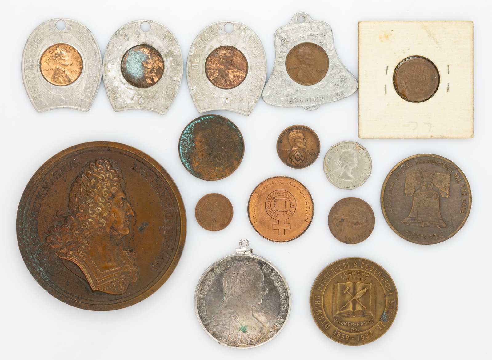ASSORTED FOREIGN AND AMERICAN COINS / TOKENS AND MEDALS, LOT OF 15: ASSORTED FOREIGN AND AMERICAN COINS / TOKENS AND MEDALS, LOT OF 15, including a "Centennial of First Use of Wyoming Coal" medal, several encased "Lucky Penny" Lincoln wheat cents, 