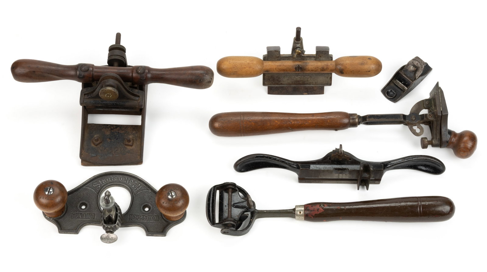 STANLEY ASSORTED WOODWORKING SCRAPING / EDGING TOOLS, LOT OF SEVEN: STANLEY ASSORTED WOODWORKING SCRAPING / EDGING TOOLS, LOT OF SEVEN, comprising of a No. 101 diminutive plane; a No. 71 1/2 router, original turned wooden handles impressed "H PAYN"; a N
