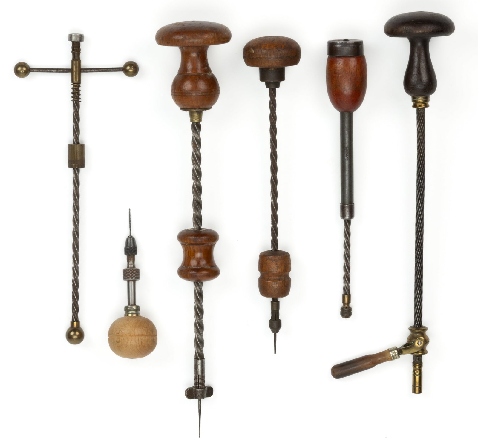 ASSORTED JEWELERS/CLOCK, ETC. ARCHIMEDEAN HAND DRILLS, LOT OF SIX: ASSORTED JEWELERS/CLOCK, ETC. ARCHIMEDEAN HAND DRILLS, LOT OF SIX, comprising of four examples with a sliding handle on a spiraling shaft for activation, three examples with wooden knobs and