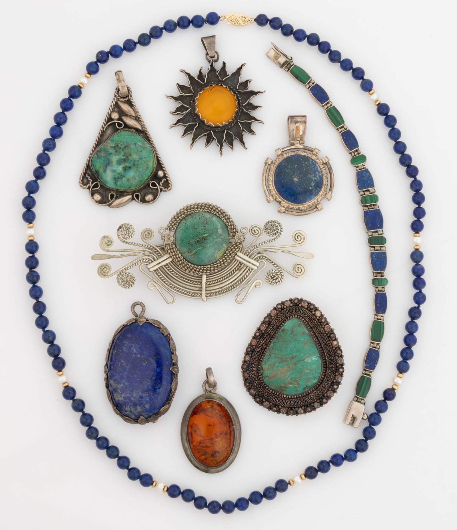 VINTAGE / CONTEMPORARY STERLING SILVER AND OTHER JEWELRY, LOT OF NINE: VINTAGE / CONTEMPORARY STERLING SILVER AND OTHER JEWELRY, LOT OF NINE, comprising three marked sterling silver pendants with stones or amber including one being sun form and an ovoid example with Poli
