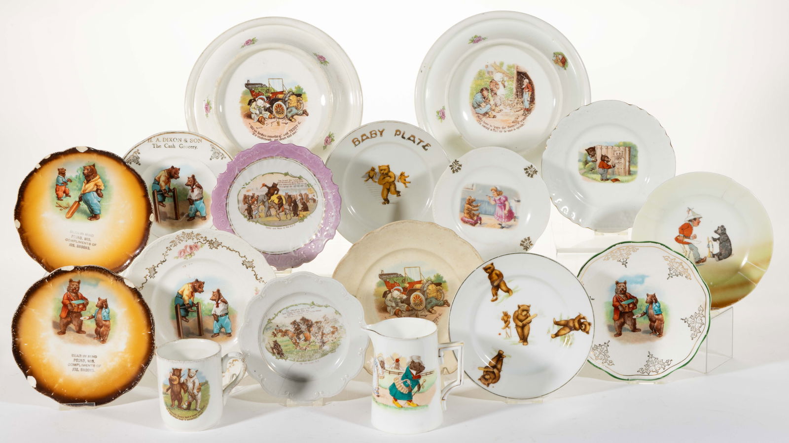 ASSORTED TRANSFER-PRINTED CERAMIC ROOSEVELT BEARS / TEDDY BEAR MOTIF ARTICLES, LOT OF 17: ASSORTED TRANSFER-PRINTED CERAMIC ROOSEVELT BEARS / TEDDY BEAR MOTIF ARTICLES, LOT OF 17, including three advertising examples including "H.A. DIXON & SON / The Cash Grocery." and Joseph