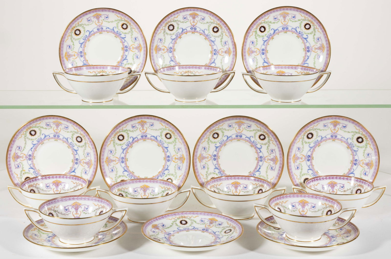 ENGLISH MINTONS NEOCLASSICAL MOTIF (H2919) PORCELAIN BOUILLON CUPS AND SAUCERS, LOT OF 19: ENGLISH MINTONS NEOCLASSICAL MOTIF (H2919) PORCELAIN BOUILLON CUPS AND SAUCERS, LOT OF 19, each featuring mulberry transfer-printed profiles of classical figures framed by laurel wreaths with addition
