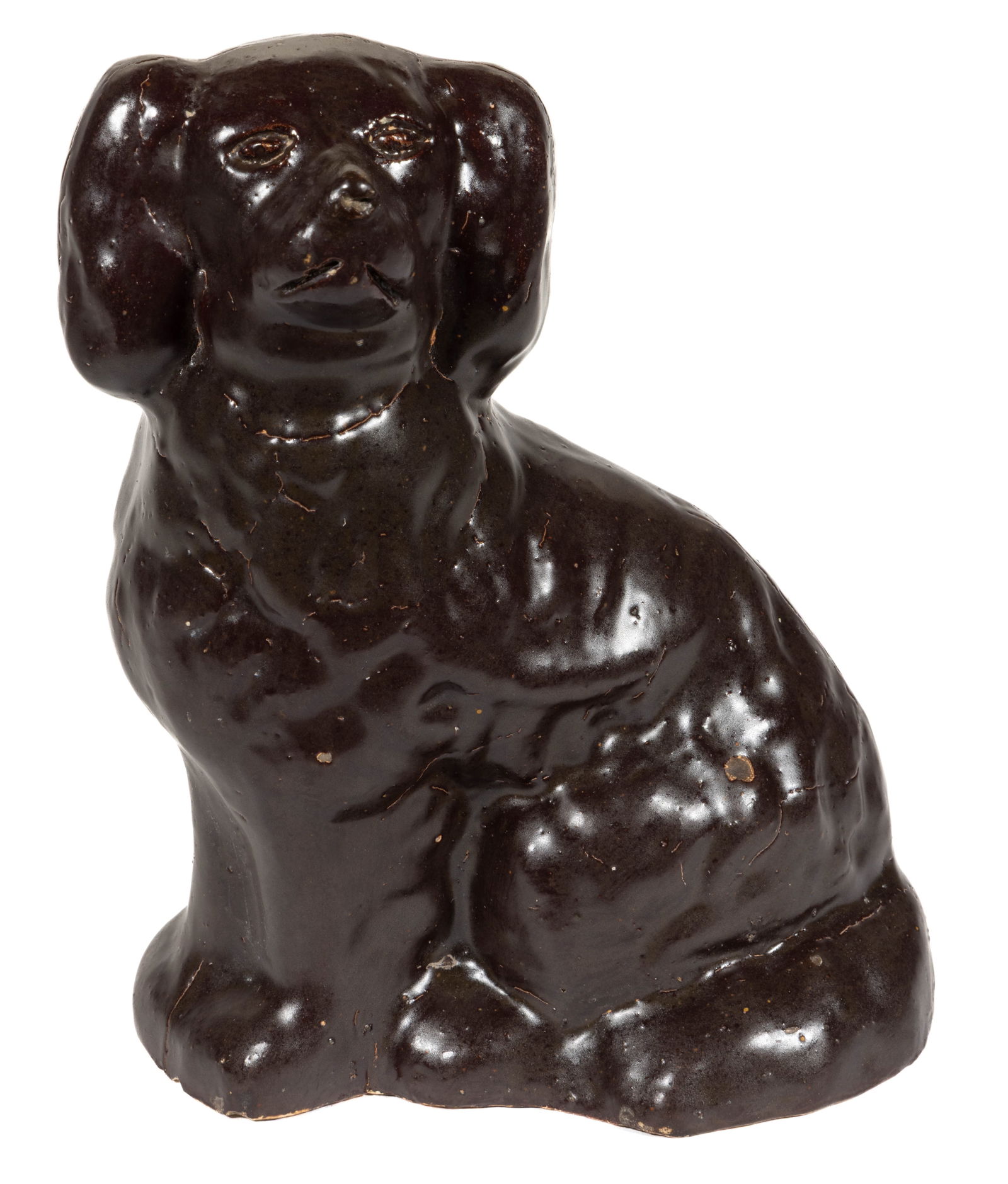 JANE LEW, WEST VIRGINIA ATTRIBUTED STONEWARE SPANIEL / DOG FIGURAL DOORSTOP: JANE LEW, WEST VIRGINIA ATTRIBUTED STONEWARE SPANIEL / DOG FIGURAL DOORSTOP, tan colored stoneware clay coated in very thick semi-matte dark brown Albany slip glaze, with in-the-firing pitting or surf
