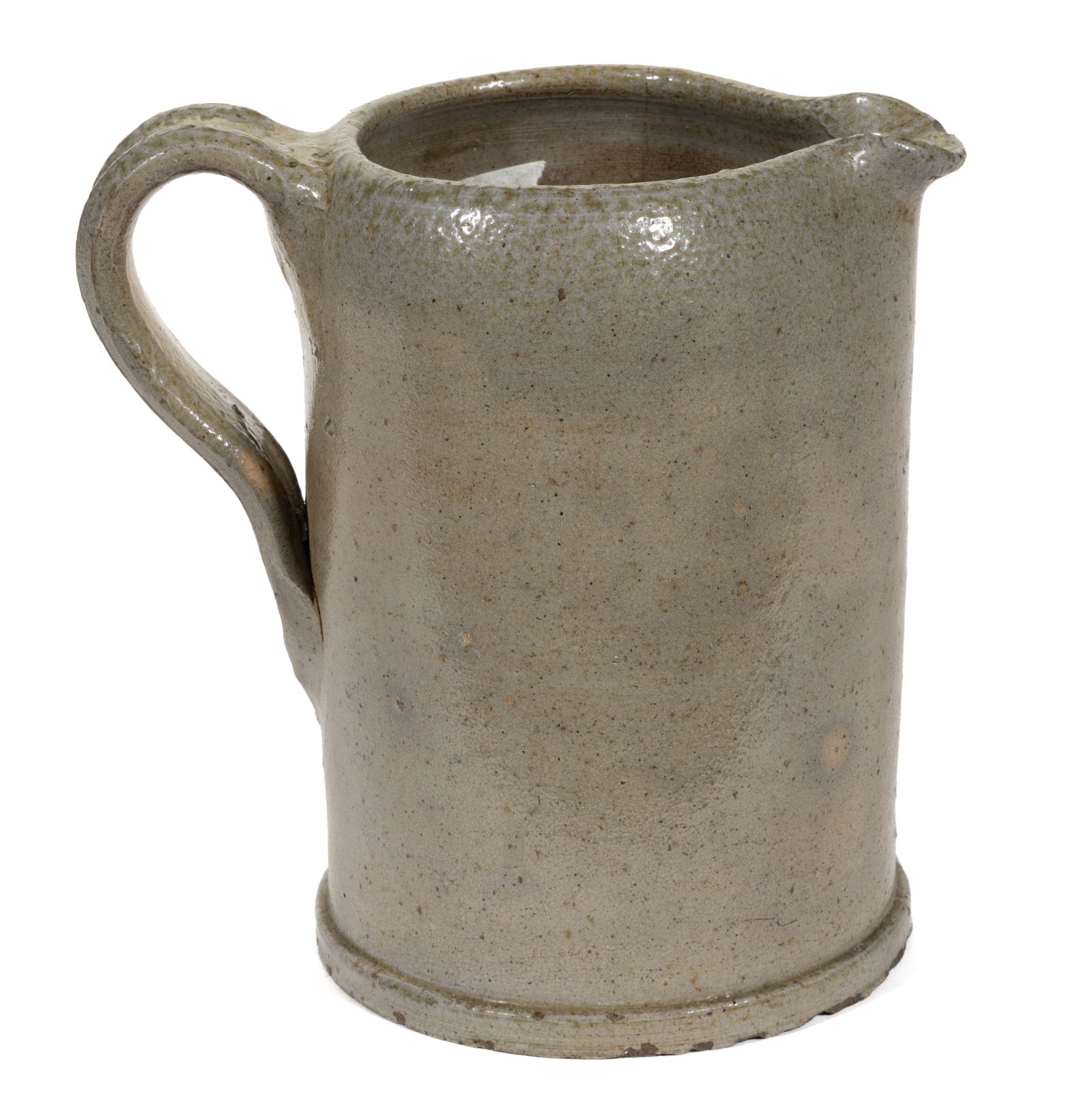 SOUTHERN STONEWARE PITCHER: SOUTHERN STONEWARE PITCHER, salt-glazed, cylindrical form with applied grooved strap handle and pronounced squared foot. 19th century. 5 3/4" HOA, 2 3/4" D rim. Provenance: 