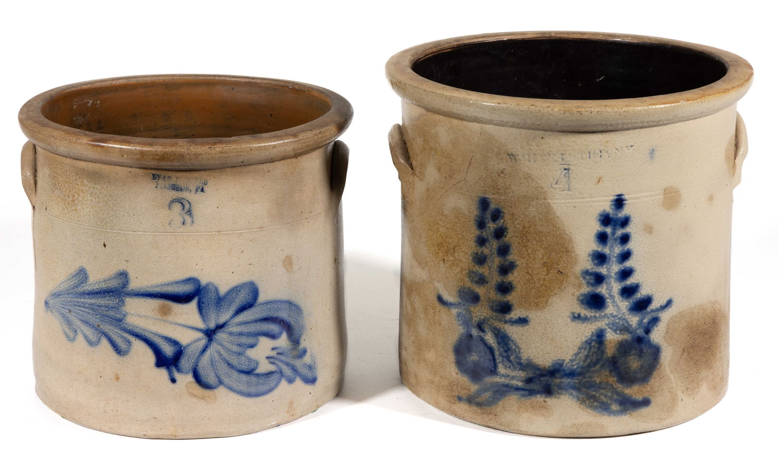 STAMPED PENNSYLVANIA AND NEW YORK DECORATED STONEWARE CROCKS, LOT OF TWO: STAMPED PENNSYLVANIA AND NEW YORK DECORATED STONEWARE CROCKS, LOT OF TWO, salt-glazed, each of wide-mouth cylindrical form with flat-top rounded rim, applied arched handles, Albany-slip glazed interio