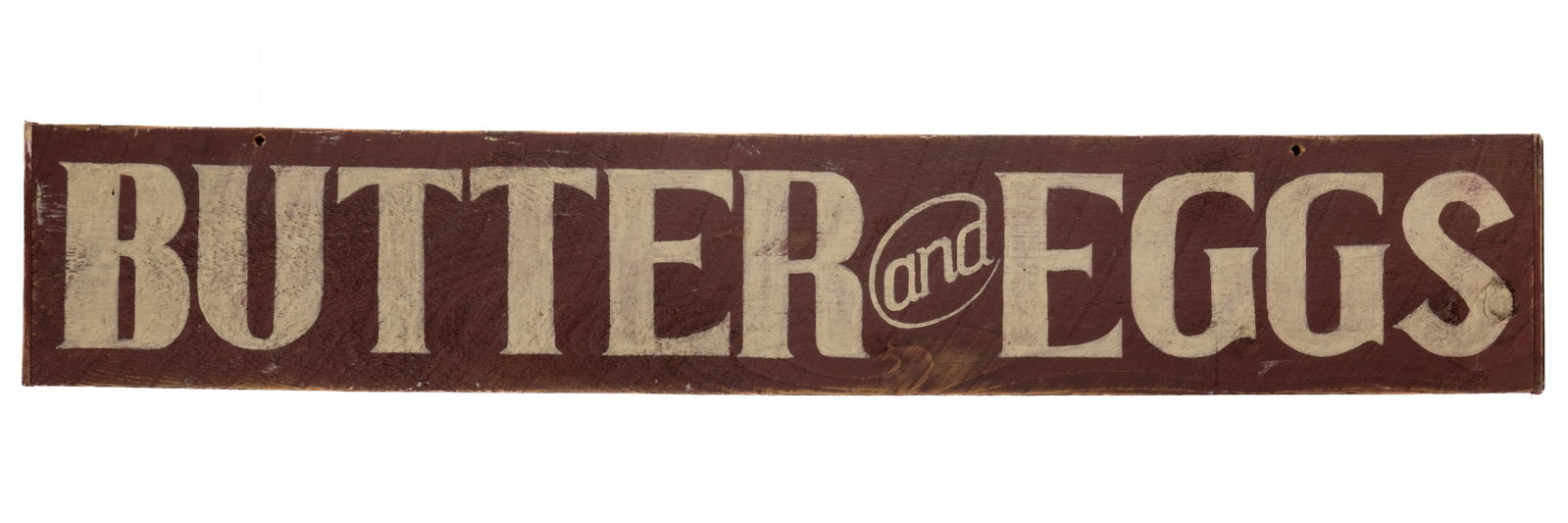 AMERICAN FOLK ART PAINTED TRADE SIGN: AMERICAN FOLK ART PAINTED TRADE SIGN, rectangular form, white lettering on a red ground reading "BUTTER and EGGS". Likely painted on an old board. Late 20th/21st century. 8" x 47" 