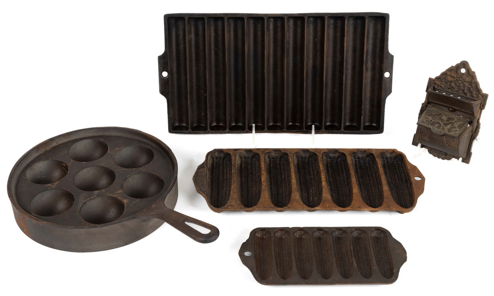 ASSORTED GRISWOLD CAST-IRON KITCHEN AND DOMESTIC ARTICLES, LOT OF FIVE: ASSORTED GRISWOLD CAST-IRON KITCHEN AND DOMESTIC ARTICLES, LOT OF FIVE, comprising of two corn bread pans, including a No. 262 with impressed pattern no. 625 and a No. 273 with impressed pattern no. 9