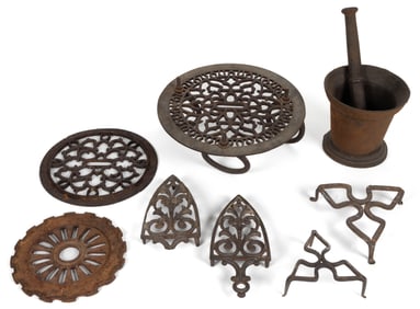 ASSORTED CAST-IRON AND WROUGHT-IRON TRIVETS AND DOMESTIC ARTICLES, LOT OF EIGHT