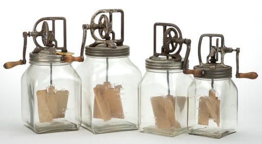 DAZEY GLASS BUTTER CHURNS, GRADUATED SET OF FOUR
