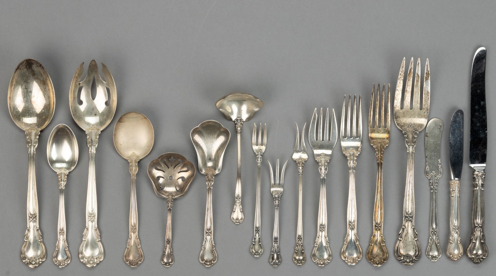 GORHAM "CHANTILLY" STERLING SILVER 98-PIECE FLATWARE SERVICE: GORHAM "CHANTILLY" STERLING SILVER 98-PIECE FLATWARE SERVICE, pattern designed in 1895 by William C. Codman, Comprising 11 place forks, eight luncheon forks, 20 sala