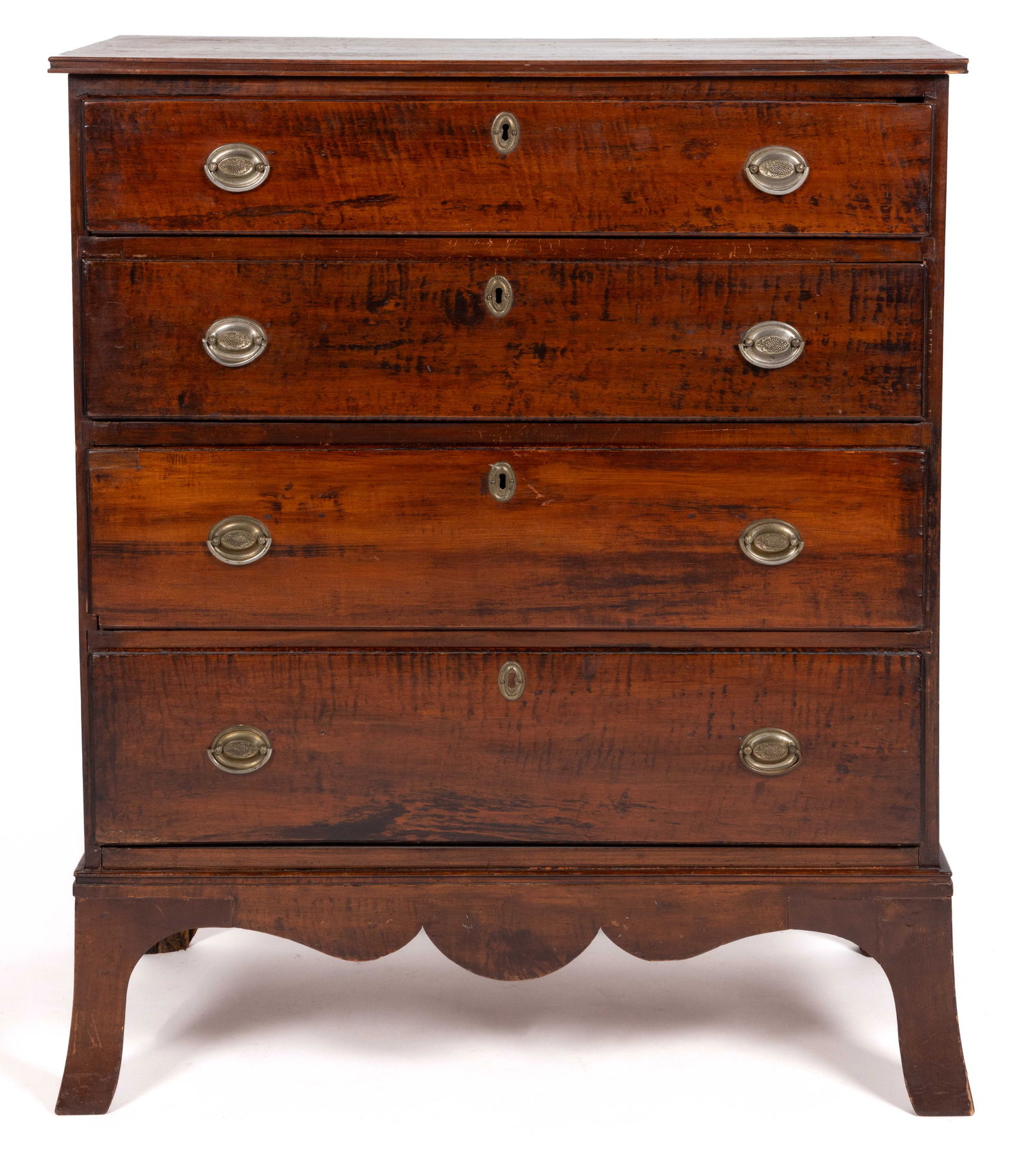 NEW ENGLAND CHIPPENDALE TIGER / FIGURED MAPLE CHEST OF DRAWERS: NEW ENGLAND CHIPPENDALE TIGER / FIGURED MAPLE CHEST OF DRAWERS, the rectangular molded-edge top over four graduated full drawers, the whole flanked by solid ends and raised on tall bracket feet flanki