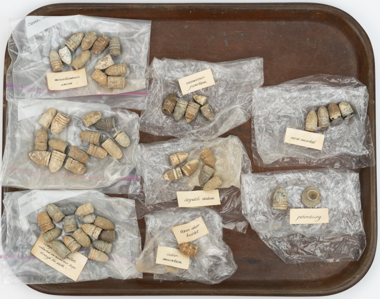 CIVIL WAR CONFEDERATE AND UNION EXCAVATED BULLETS, LOT OF 58: CIVIL WAR CONFEDERATE AND UNION EXCAVATED BULLETS, LOT OF 58, lead, various styles, some with recovery identification, including four from New Market, two from Petersburg, one from Cedar Mountain, fiv