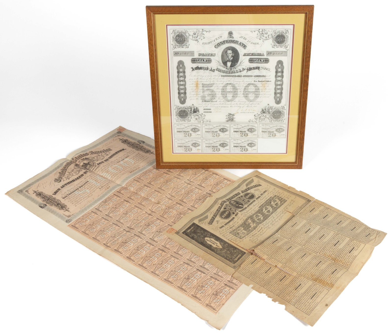 CIVIL WAR CONFEDERATE STATES LOAN BONDS, LOT OF THREE: CIVIL WAR CONFEDERATE STATES LOAN BONDS, LOT OF THREE, comprising (1) $500, Feb. 20, 1863, with seven coupons; (2) unissued $1,000, April 30, 1863, with complete coupons; and (3) $1,000, Feb. 17, 1864