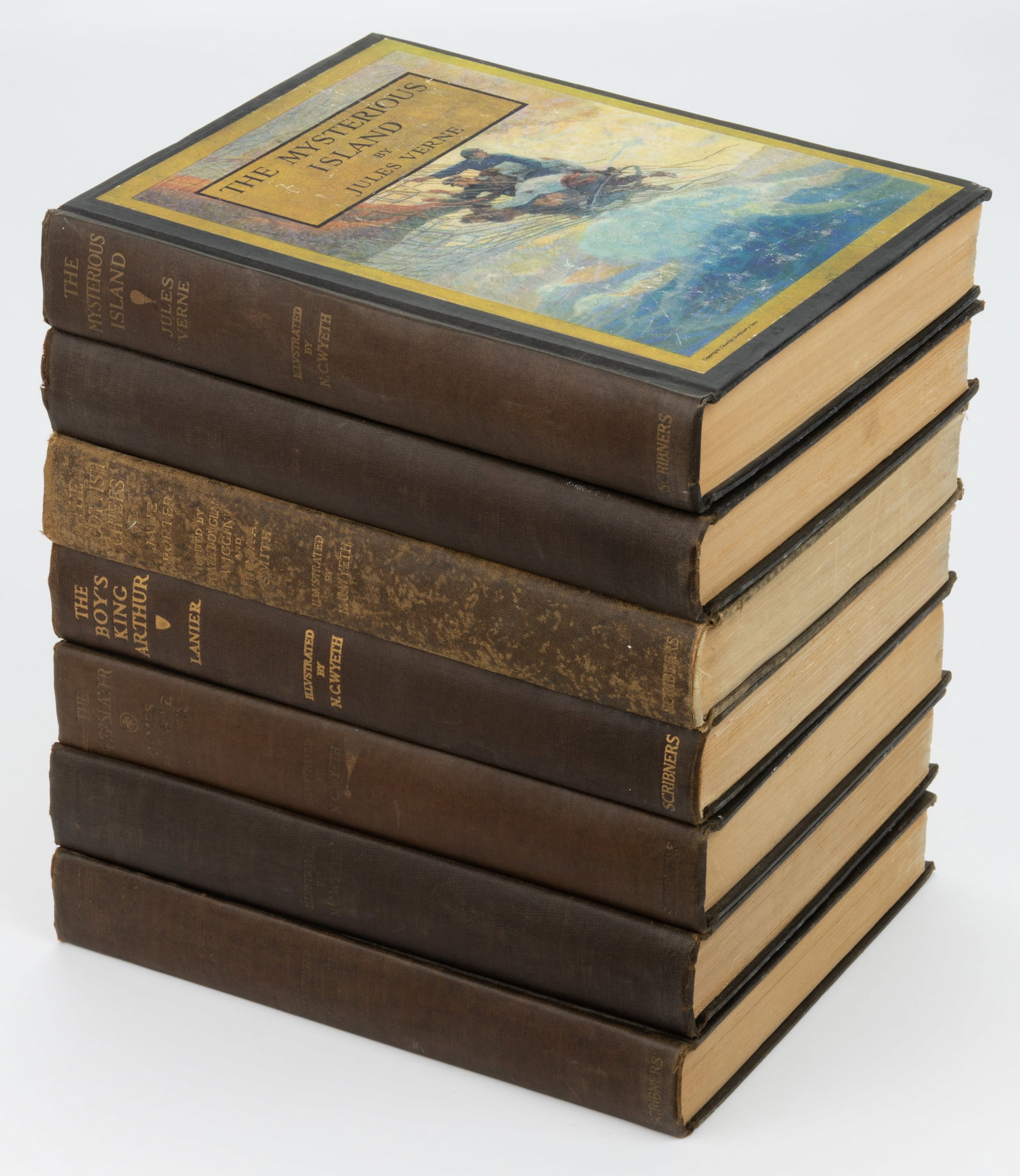 ANTIQUARIAN AND VINTAGE N. C. WYETH ILLUSTRATED JUVENILE FICTION VOLUMES, LOT OF SEVEN: ANTIQUARIAN AND VINTAGE N. C. WYETH ILLUSTRATED JUVENILE FICTION VOLUMES, LOT OF SEVEN, (1) Lanier, The Boy's King Arthur, 1929; (2) Cooper, The Deerslayer, 1929; (3) Stevenson