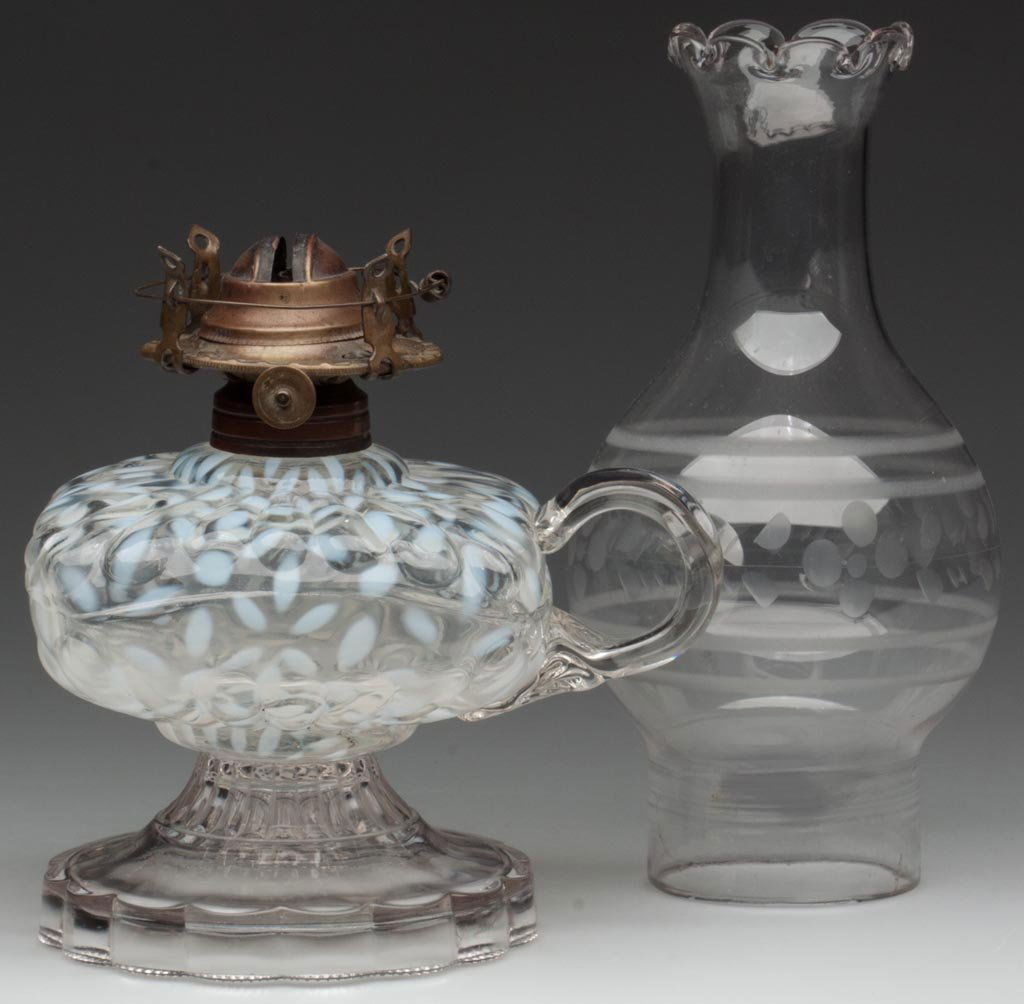 HOBBS NO. 341 / SNOWFLAKE FOOTED FINGER LAMP: HOBBS NO. 341 / SNOWFLAKE FOOTED FINGER LAMP Crystal opalescent/colorless opalescent font, colorless base, colorless applied handle with pressed rib pattern to lower terminal, No. 1 Taplin-Brown colla