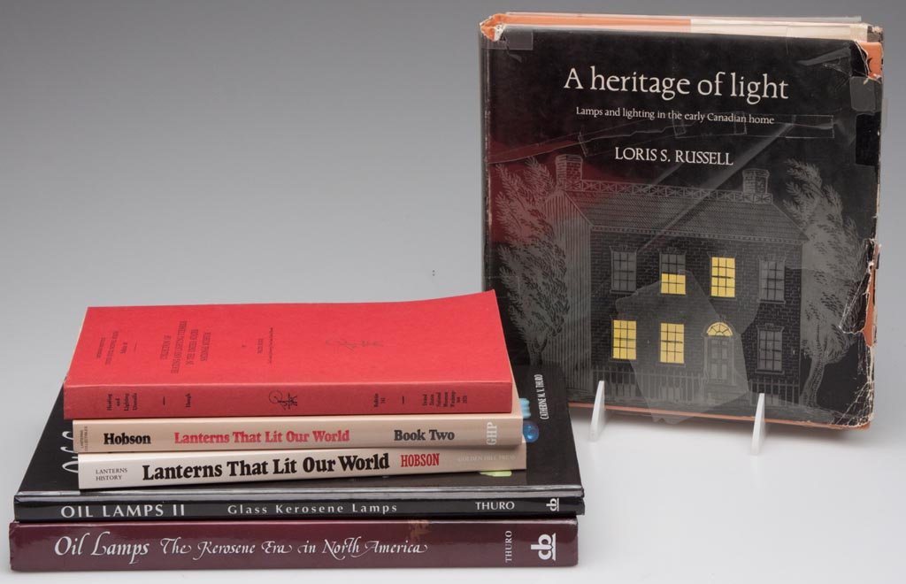 VARIOUS LIGHTING REFERENCE VOLUMES, LOT OF SIX: VARIOUS LIGHTING REFERENCE VOLUMES, LOT OF SIX including Russell, "A Heritage of Light", Hobson, "Lanterns That Lit Our World", books one and two, and Thuro I and II. Hard and soft covers. Provenance: