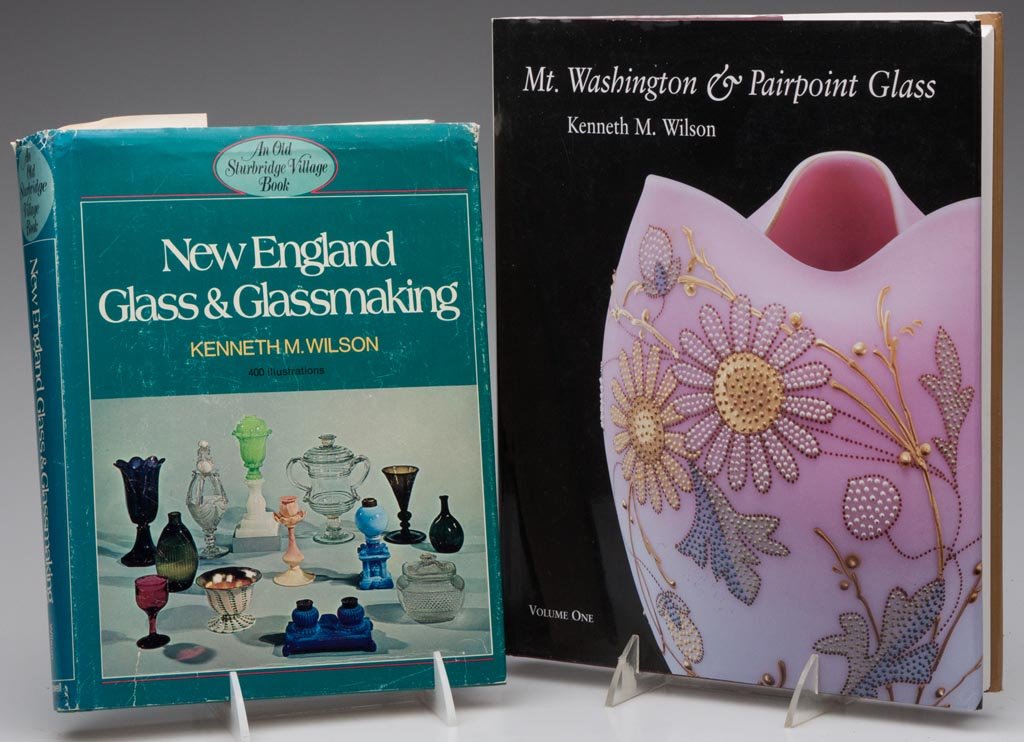 NEW ENGLAND GLASS REFERENCE VOLUMES, LOT OF TWO: NEW ENGLAND GLASS REFERENCE VOLUMES, LOT OF TWO by Kenneth M. Wilson, comprising "New England Glass & Glassmaking" and "Mt. Washington & Pairpoint Glass", volume 1. Hard covers with dust jackets. Prov