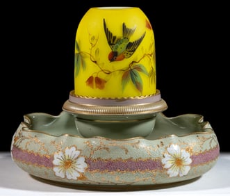 VICTORIAN DECORATED CASED SATIN GLASS AND ENGLISH TAPESTRY-WARE CERAMIC FAIRY LAMP