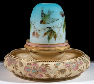 VICTORIAN DECORATED CASED SATIN GLASS AND ENGLISH TAPESTRY-WARE CERAMIC FAIRY LAMP