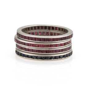 VINTAGE PLATINUM AND GEMSTONE ETERNITY BANDS, LOT OF FOUR