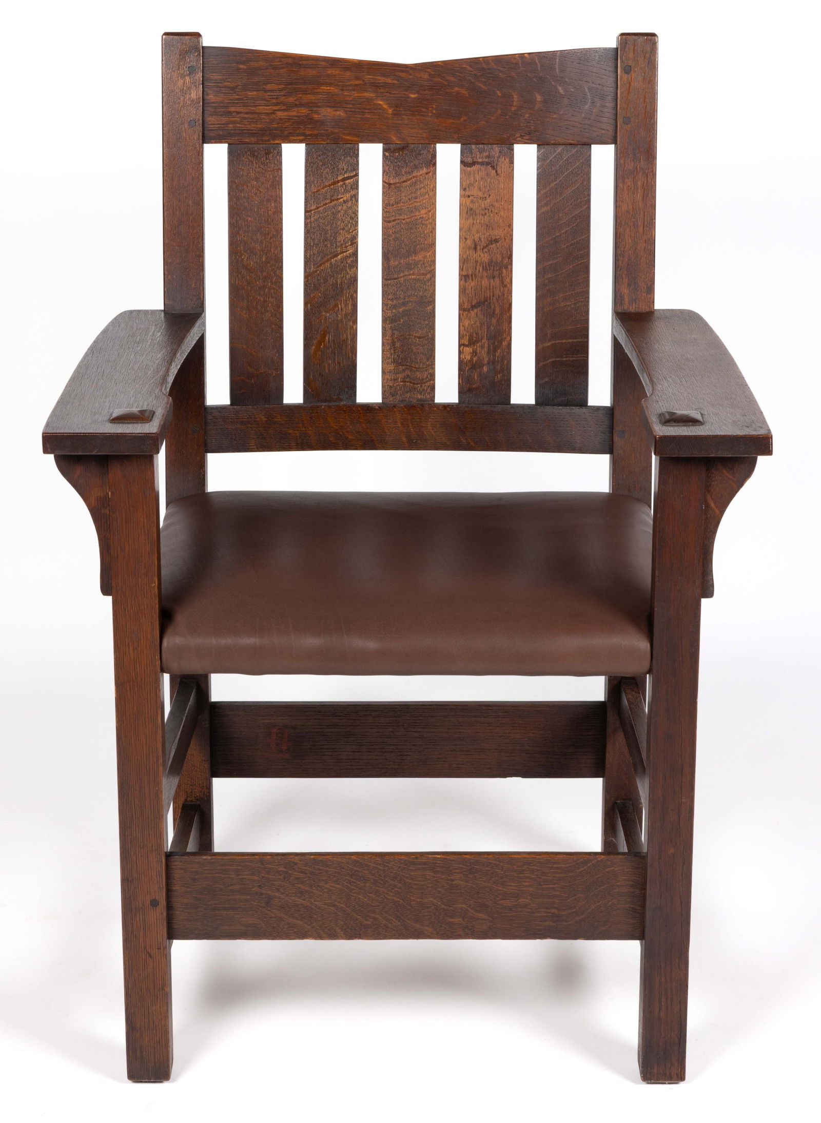 GUSTAV STICKLEY ARTS AND CRAFTS / MISSION OAK V-BACK NO. 312 1/2 ARMCHAIR: GUSTAV STICKLEY ARTS AND CRAFTS / MISSION OAK V-BACK NO. 312 1/2 ARMCHAIR, the v-notched crest rail over five vertical slats, two shaped arms supported by shaped brackets applied to square front posts