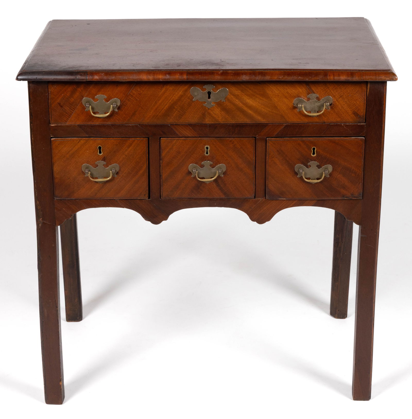 ENGLISH GEORGIAN MAHOGANY DRESSING TABLE: ENGLISH GEORGIAN MAHOGANY DRESSING TABLE, diminutive form in the manner of Thomas Chippendale, featuring top with molded edge, single full drawer over three short drawers above shaped skirt, raised on