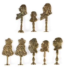 BRITISH / AMERICAN BRASS PORTRAIT NOVELTY PIPE TAMPERS, LOT OF EIGHT