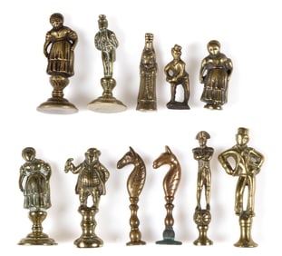 BRITISH BRASS FIGURAL NOVELTY PIPE TAMPERS, LOT OF 11