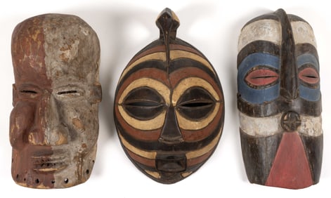 AFRICAN CARVED AND PAINTED WOODEN TRIBAL MASKS, LOT OF THREE